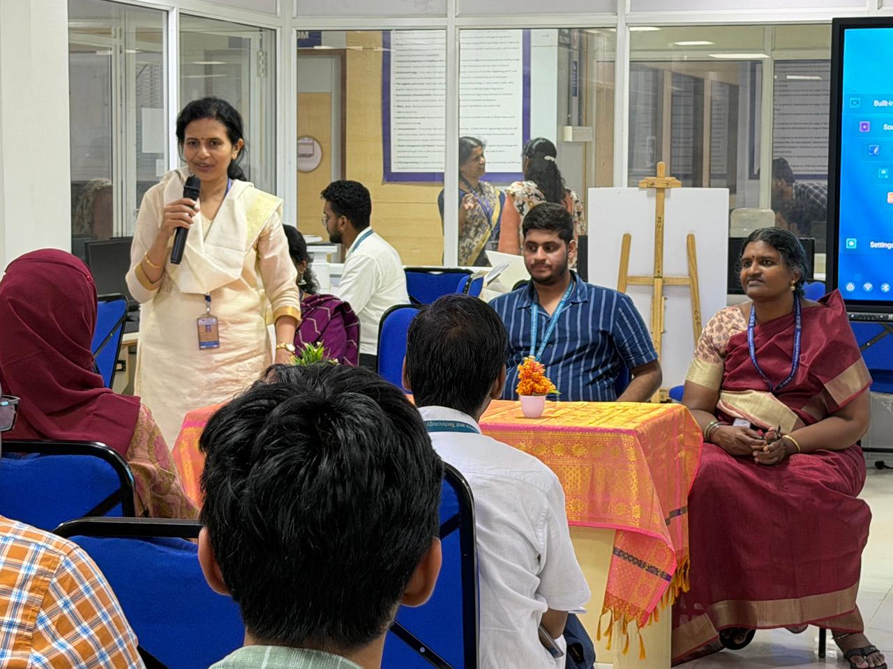 HOD of CSE, Dr. Golda Dilip ma'am, addressing the speaker and students