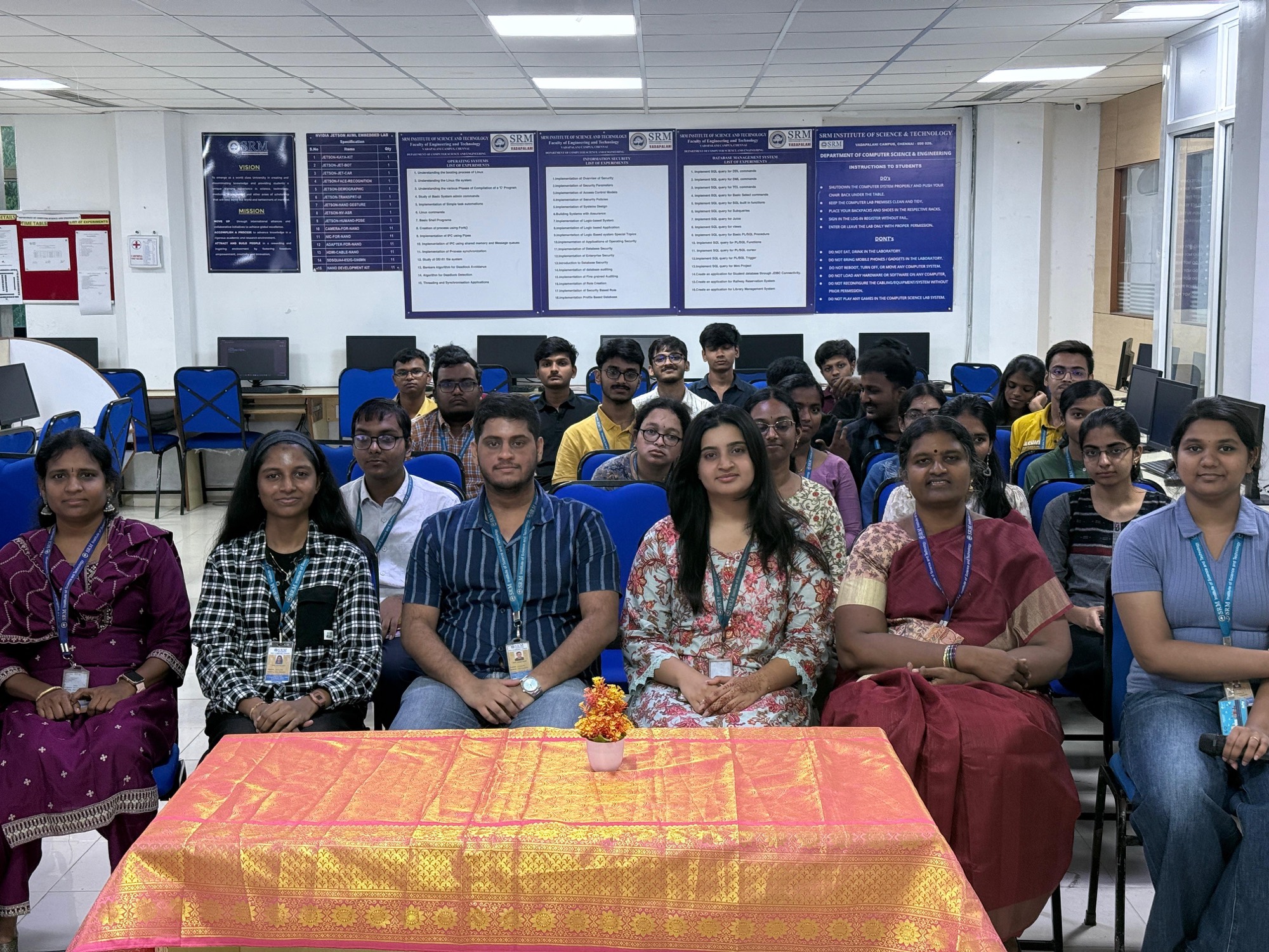 The speaker, faculty and students together after the session