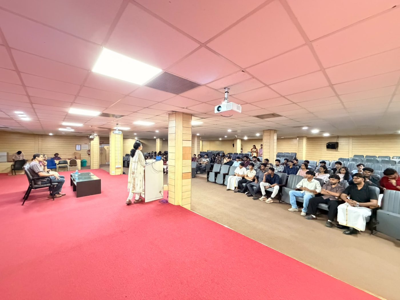 HOD of CSE, Dr. Golda Dilip ma'am, addressing the guest and students