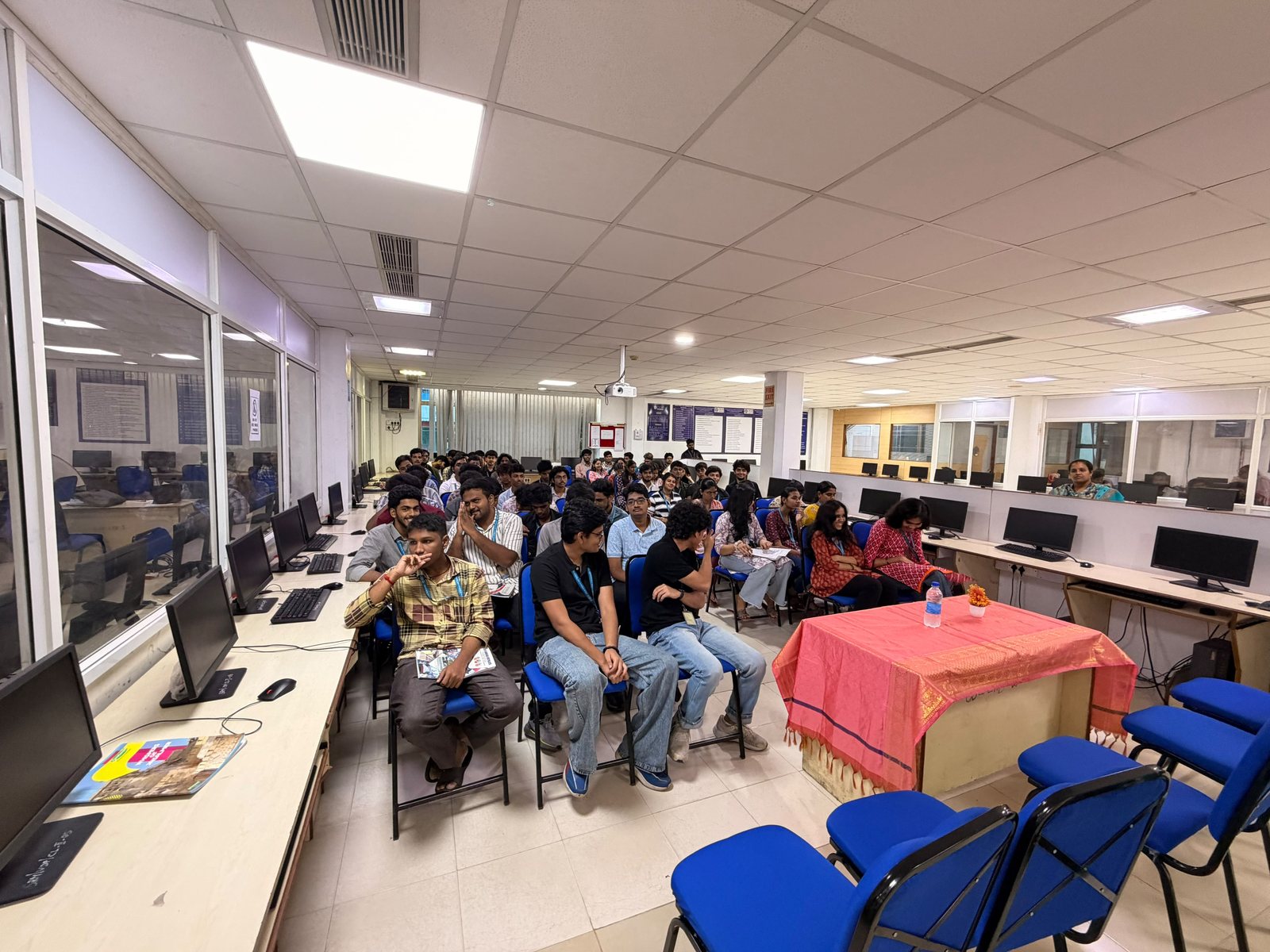 Members seated through a session in the computer lab